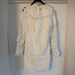 White Milly floral dress. Never worn before, tags still on. Size 8